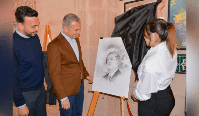 Başkan Tavlı ve Toklu Erdoğan resmini açtı